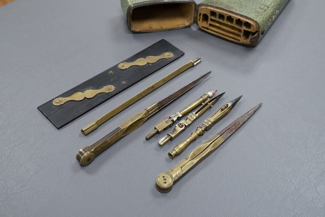A Georgian draftsman’s set in a shagreen case, with fitted interior containing drawing instruments (some missing), 17.5cm high.